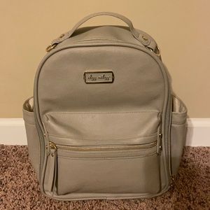 Itzy Ritzy grey mini diaper bag backpack. EUC. One bow keychain accessory.